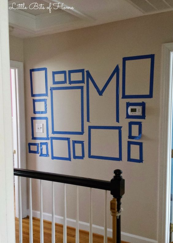using painter’s tape to outline a gallery wall