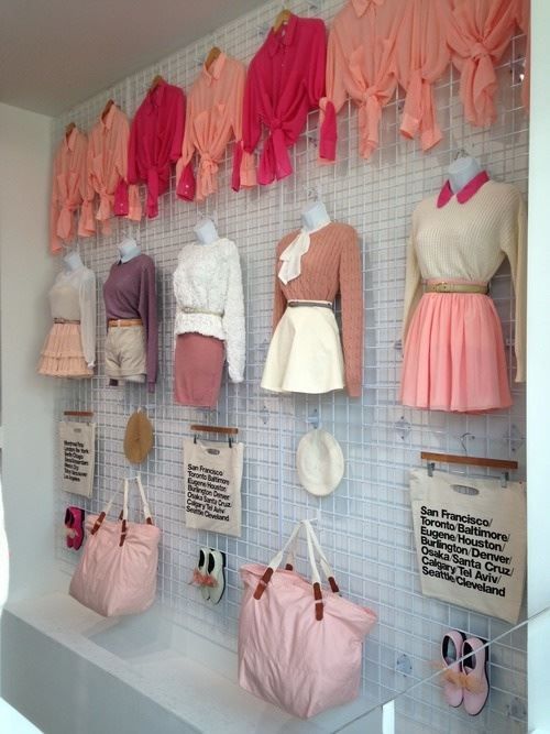 Color-coordinated clothing displayed on a gridwall