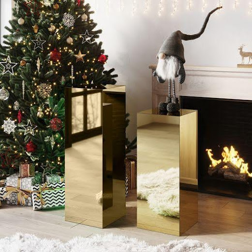 Golden Acrylic Pedestals for displaying Holiday Decor
