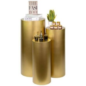 Elegant gold pedestals used to display beauty products 