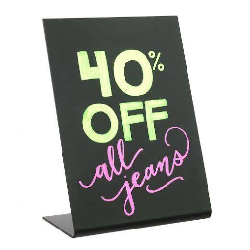 chalkboard sign displaying product sales